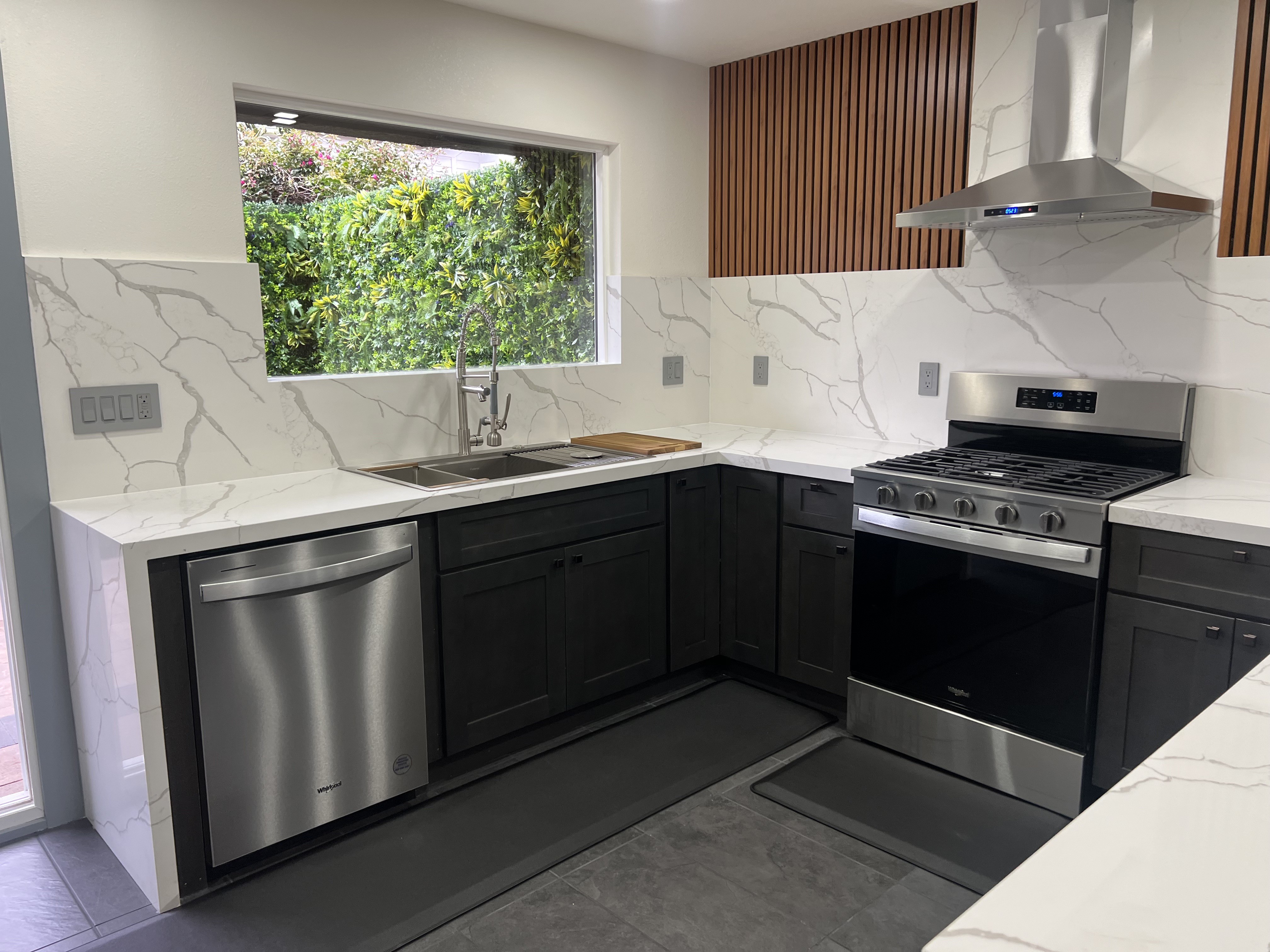 Kitchen cabinetry and stainless-steel appliances at 3000 Nicol Avenue