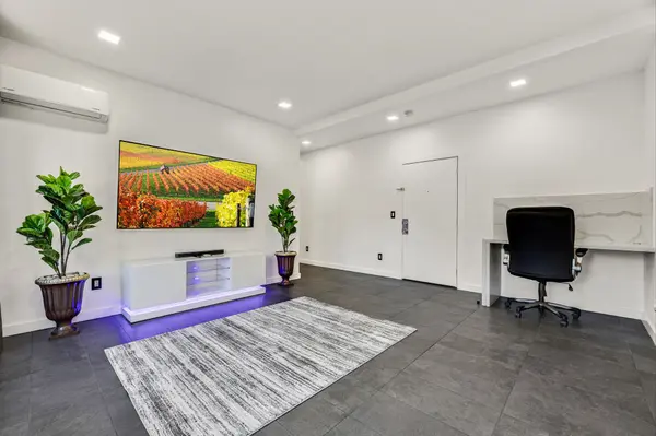 Apartment living area with desk