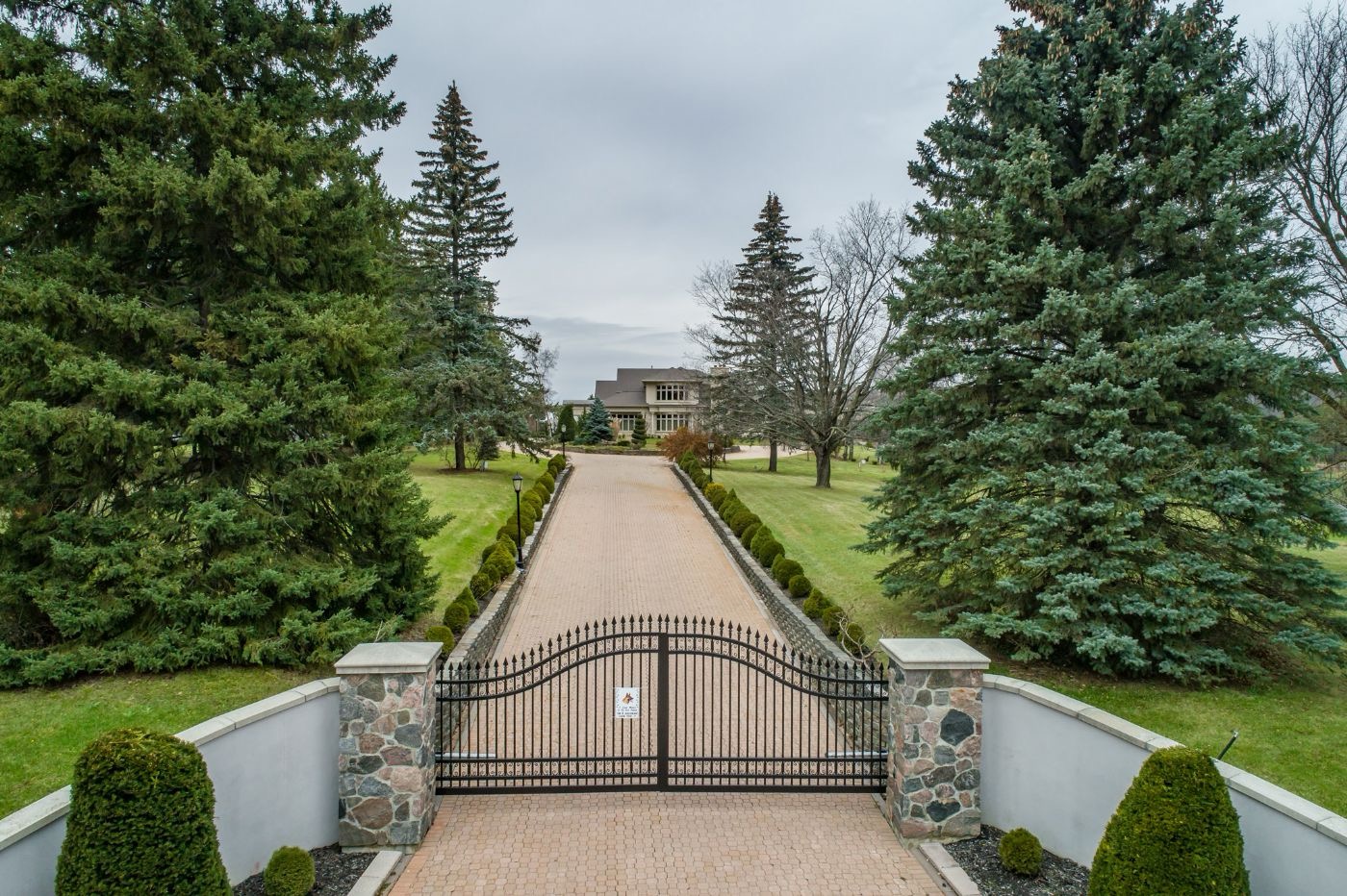King Township estate driveway with gated entrance