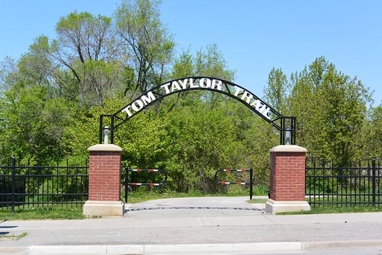 Tom Taylor Trail sign and walking path in Newmarket Ontario