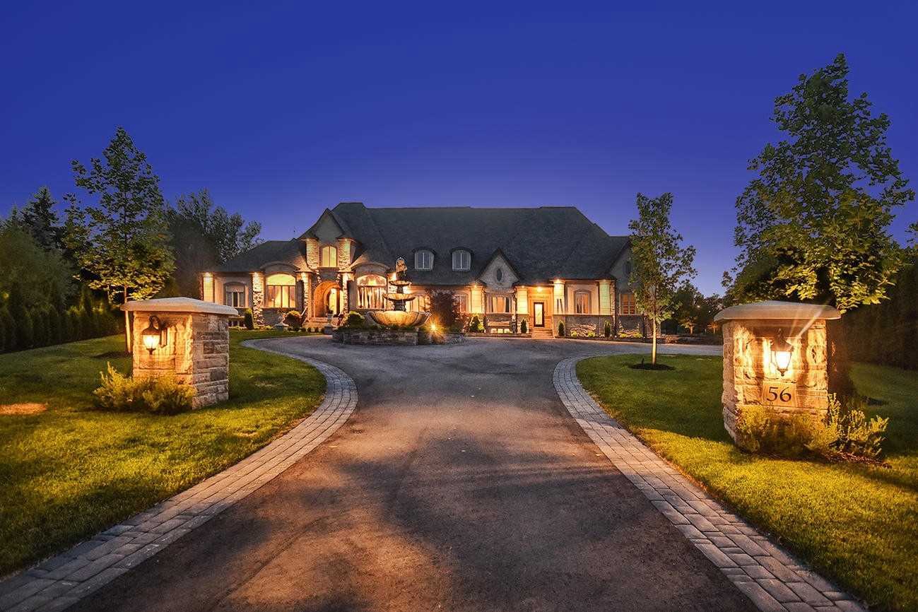 Estate driveway at night representing Schomberg luxury real estate