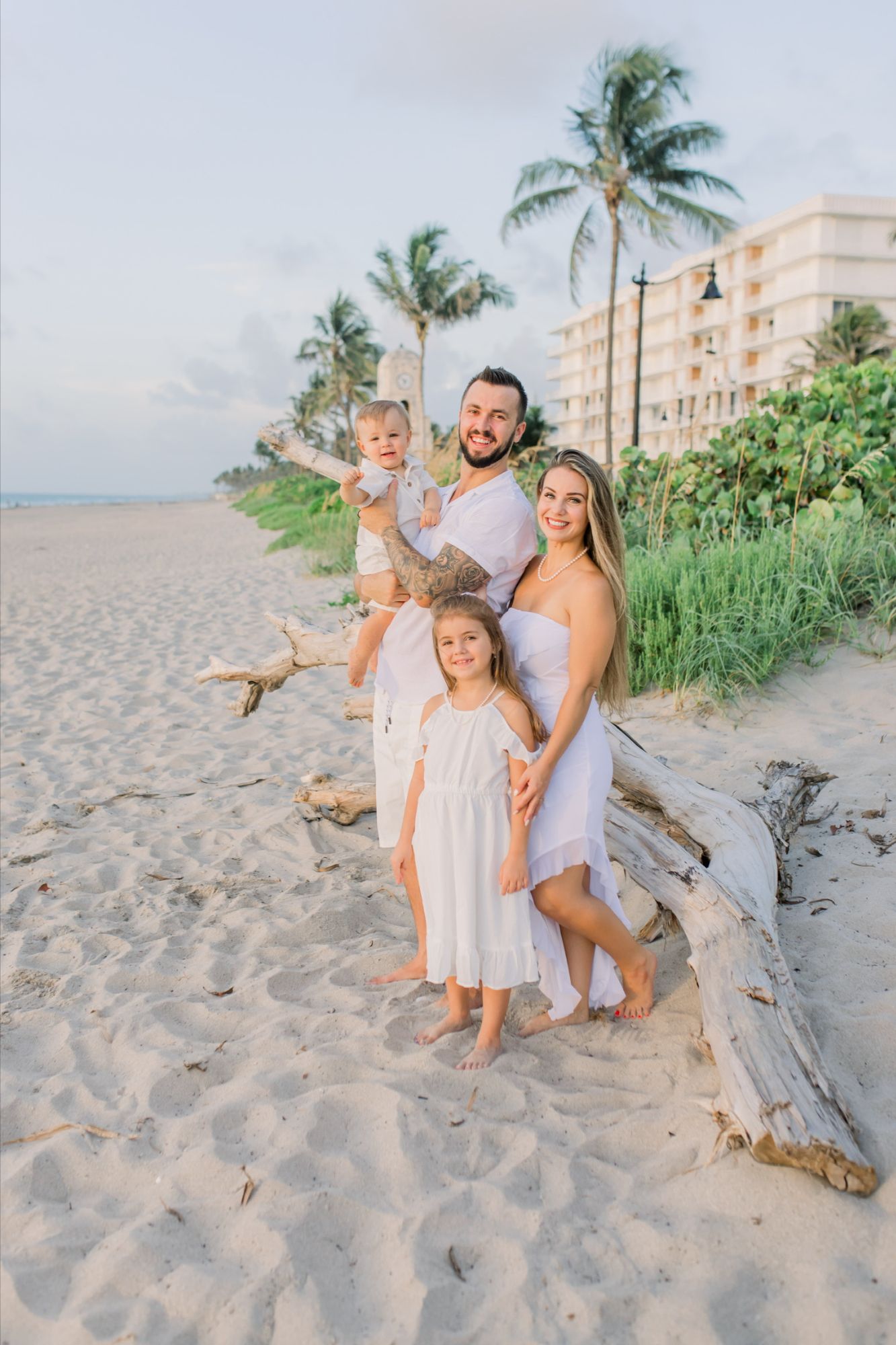 Bryan and Alexa of Luxury Premier Estates with their family near Worth Avenue in Palm Beach