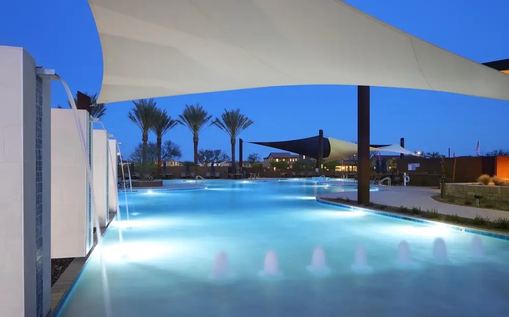Resort-style pool at dusk in Desert Ridge