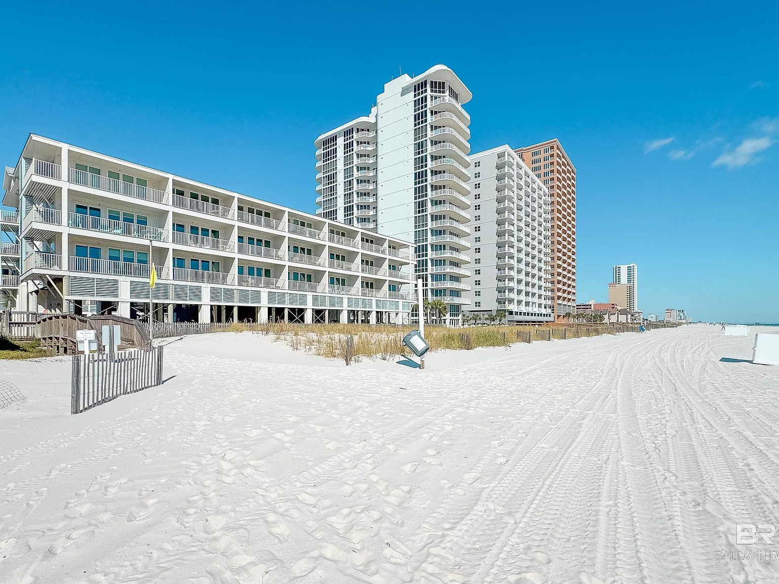Beachfront condo exterior along the Gulf Shores coast