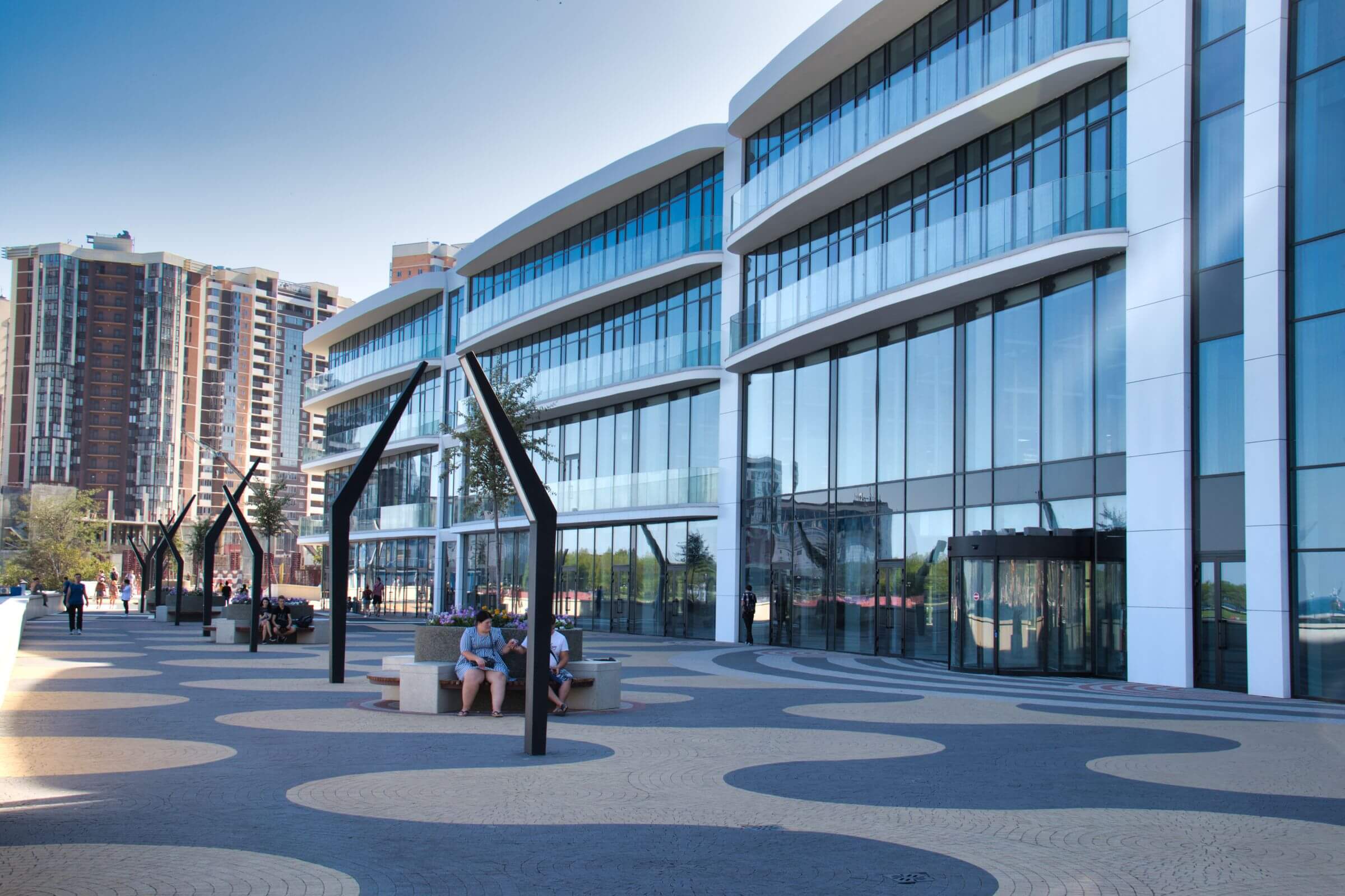 Modern glass office building representing commercial real estate services in Brant County