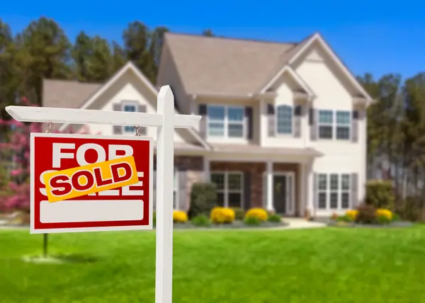 Massachusetts home with sold sign in front yard