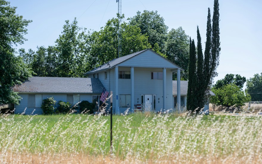 A farmhouse surrounded by fields near Woodland, California