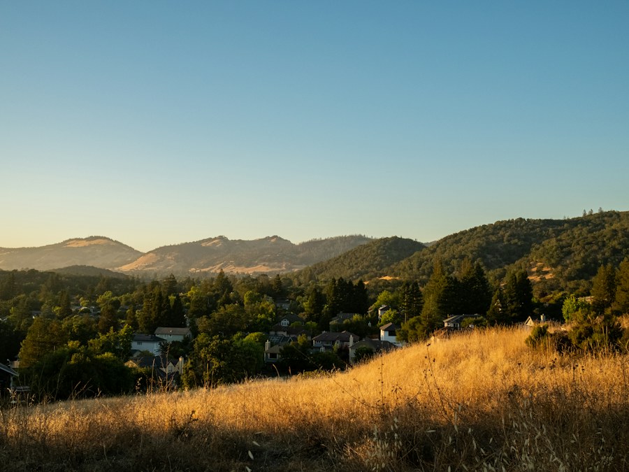 Open grassland with homes below the foothills near Lincoln, California