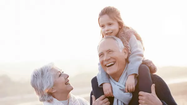 Seniors with Grandchild on Shoulder San Diego Realtor Betty Torano