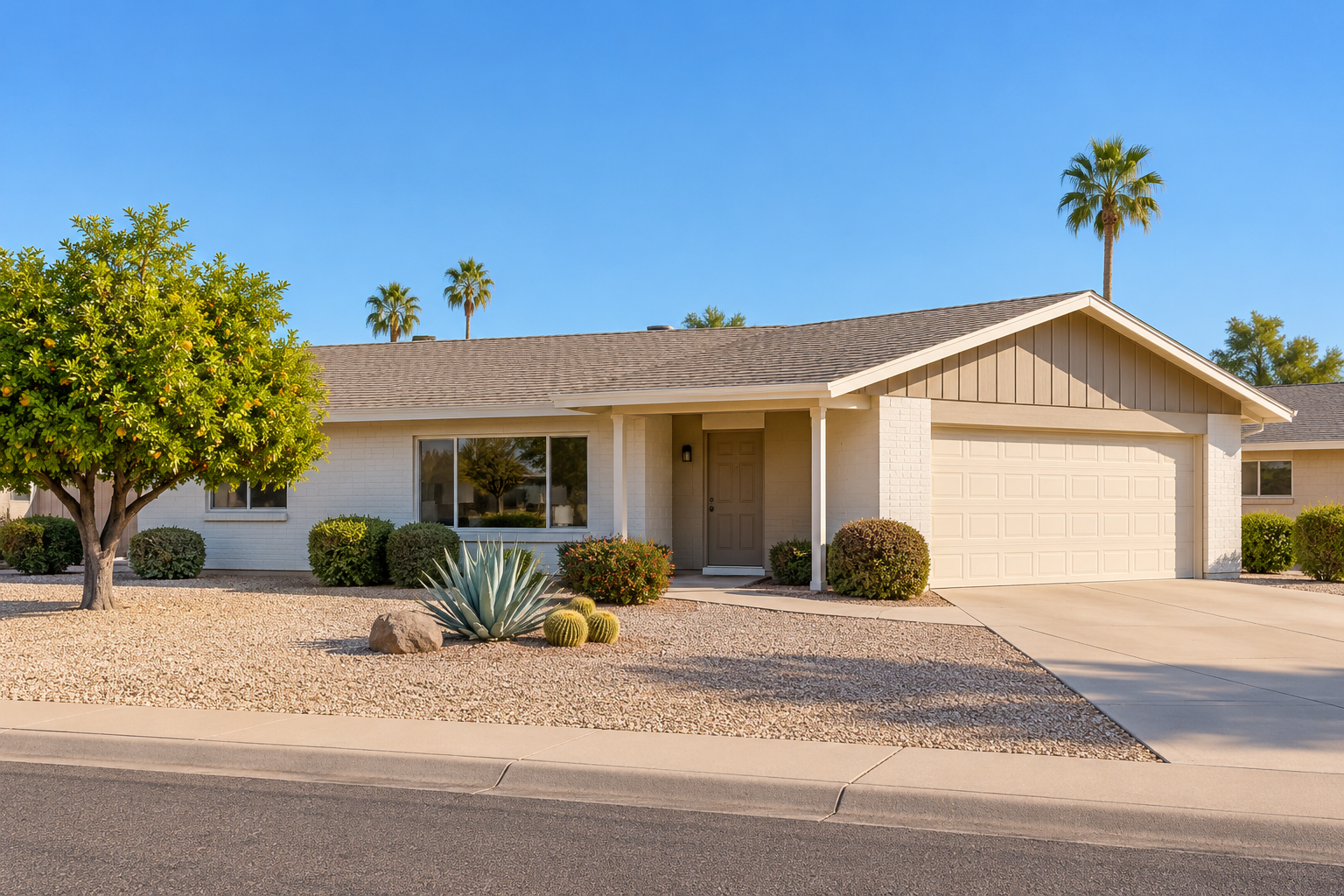 Sun City home with a front porch and desert landscaping
