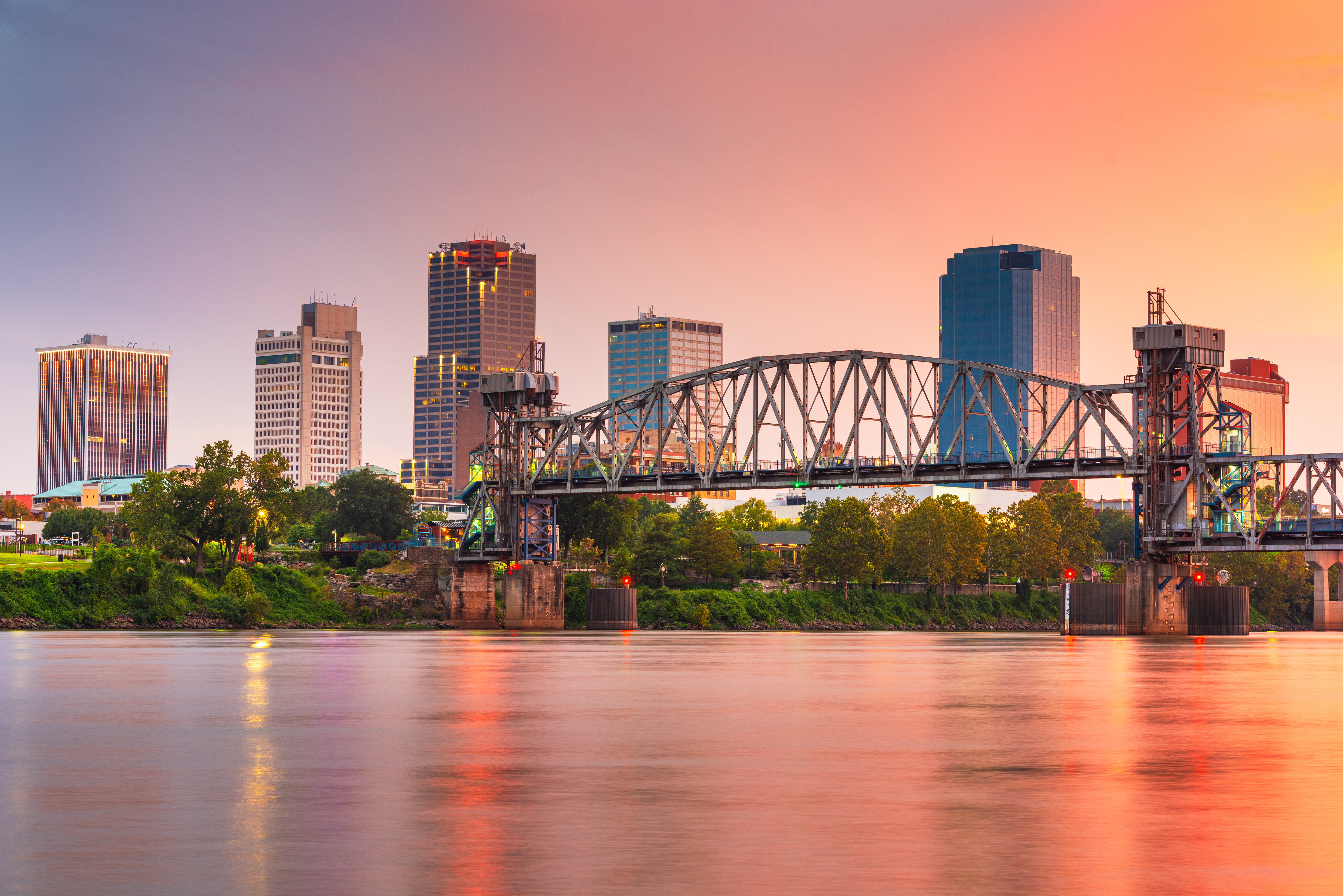 Riverfront and skyline at sunset