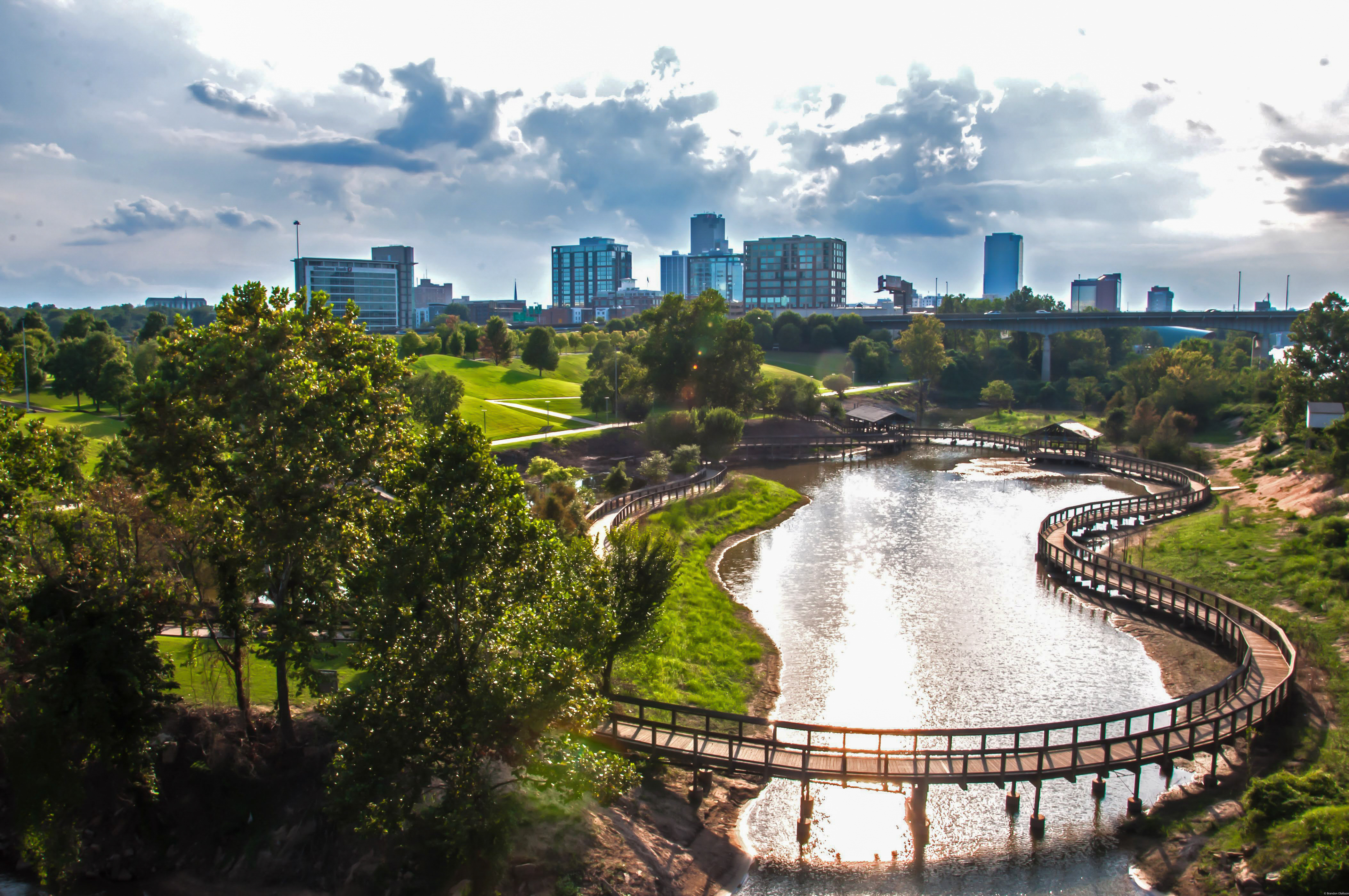 Riverside park with a footbridge