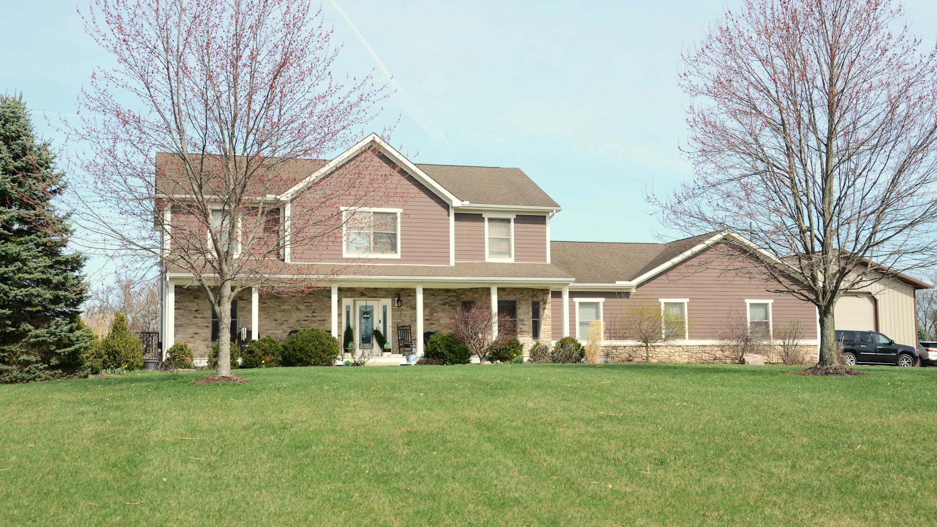 Suburban home with a green front lawn