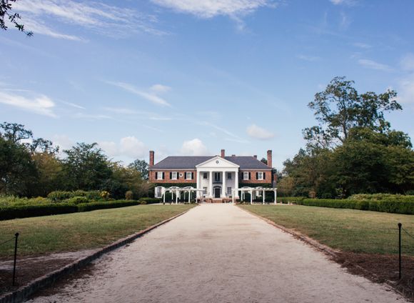 The columned facade of a historic Southern plantation home