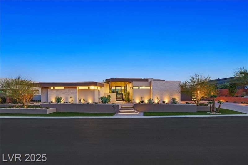 Twilight photo of a luxury home in the Ridges
