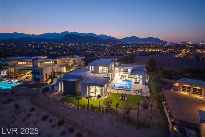 Estate home at night in the Ridges 