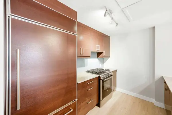 733 2 AVE SW #103, Calgary, AB T2P 0E4