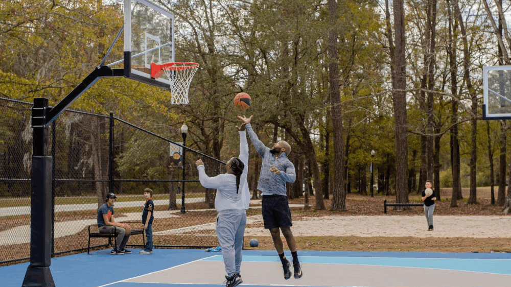 Group playing basketball at Central Creek Park in Goose Creek, SC