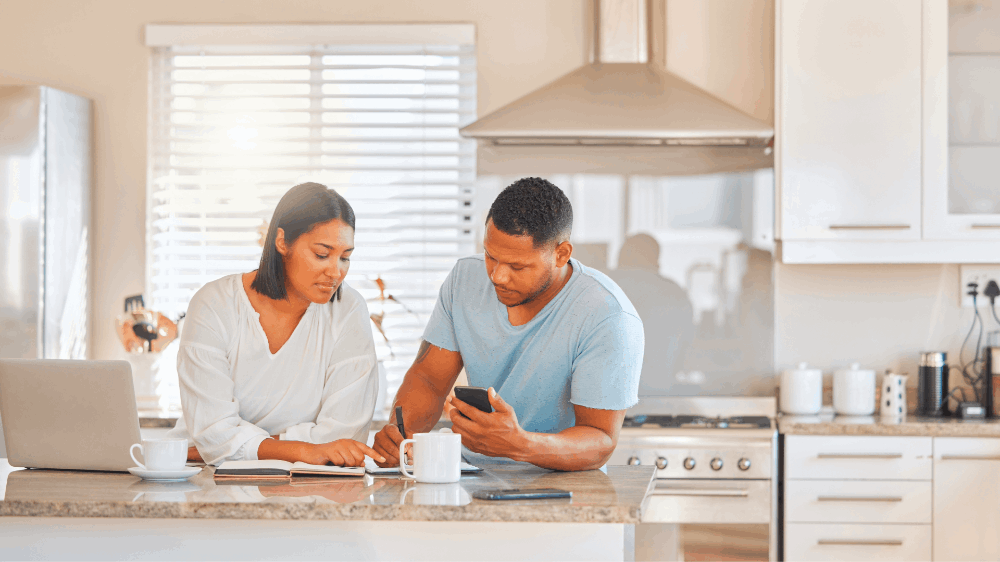 Young couple going over utility bills