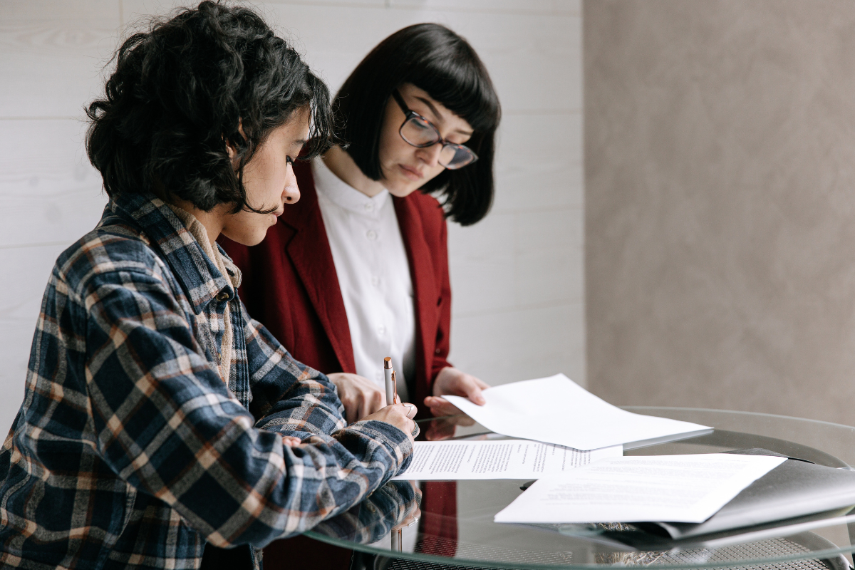 Real estate agent reviewing Orlando home pricing strategy with a seller