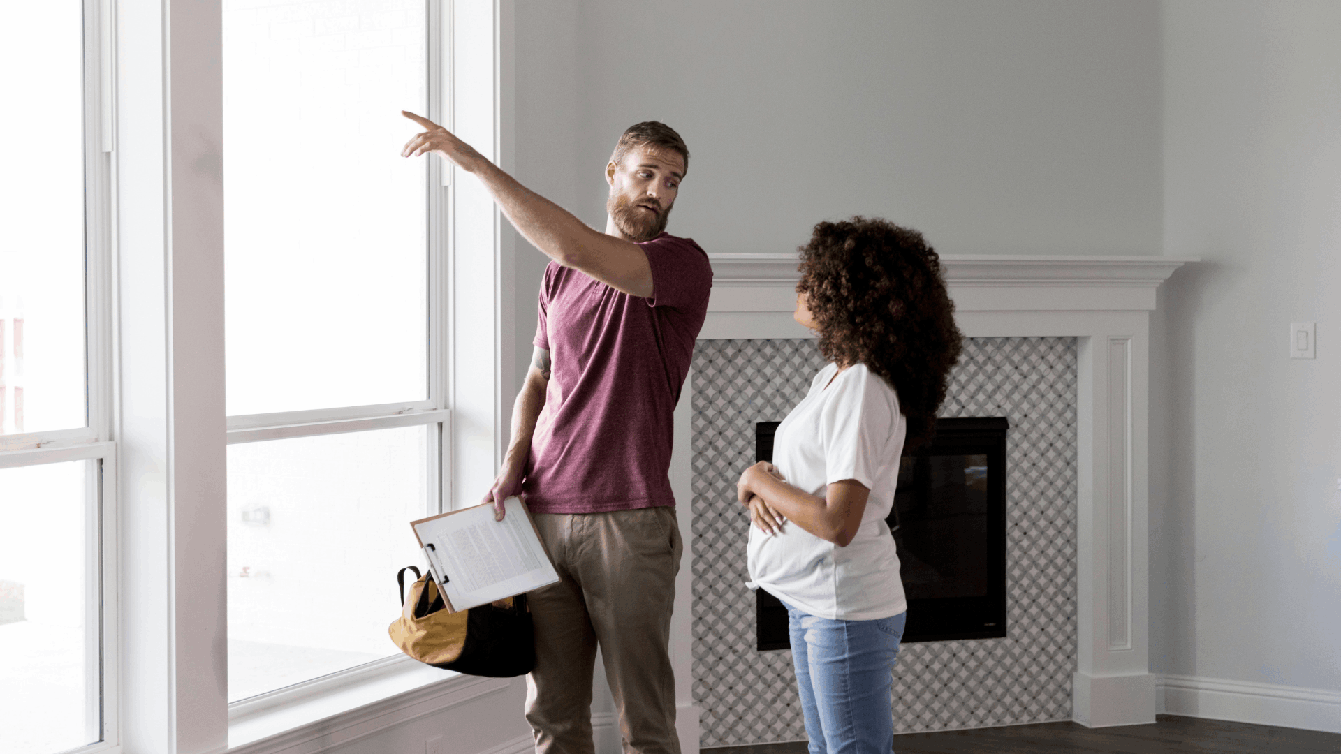 Buyer attending a home inspection with an inspector and real estate agent