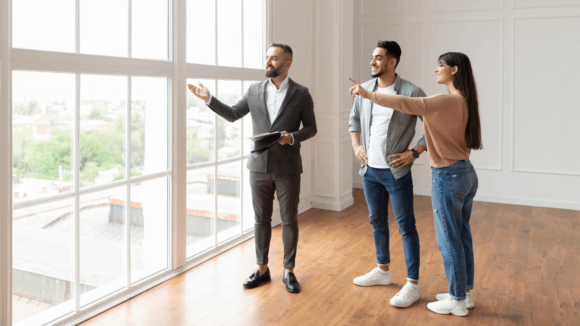 Home inspector walking through an Orlando home with buyers
