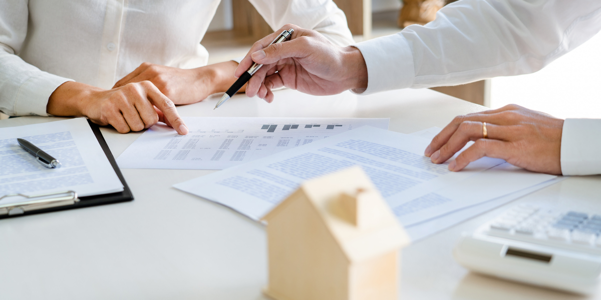 Seller reviewing disclosure paperwork before listing a home