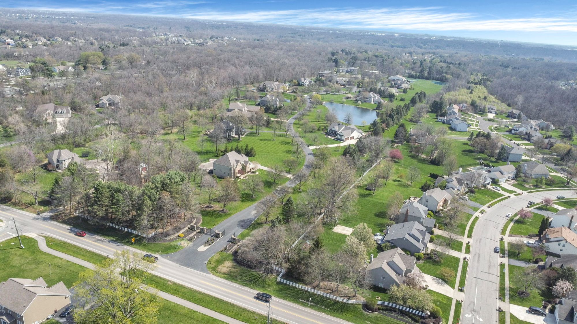 Aerial view of Powell Ohio neighborhood with wooded lots and upscale homes