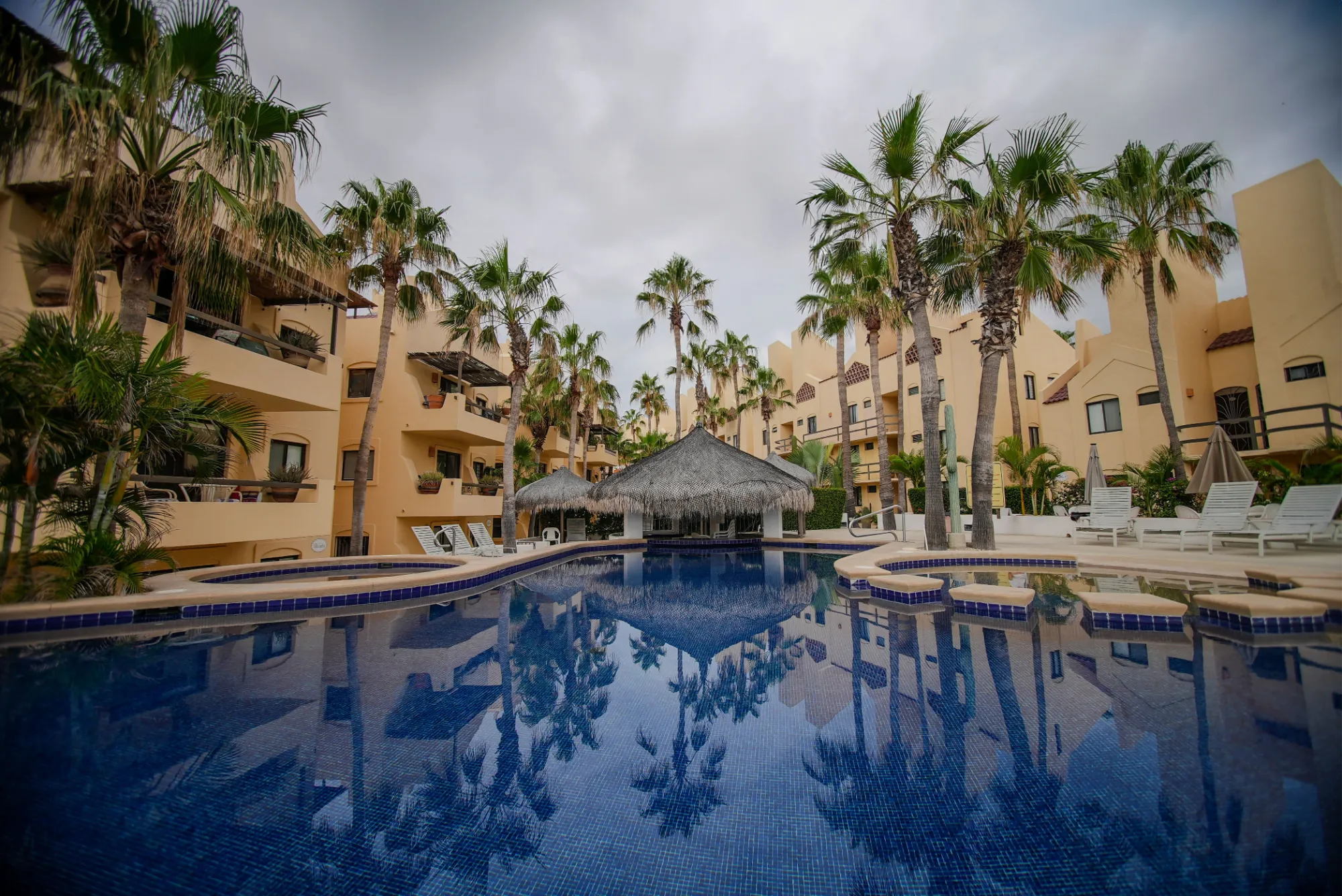Swimming pool and landscaped common area at Club La Costa, San José del Cabo