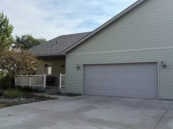 Charming Sartell Twin Home – Investor Opportunity with Scenic Pond Views!
