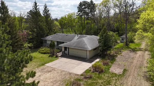 feature image of Opportunity Awaits: 3BR Ham Lake Home with Extra Garage Space &amp; Future Potential
