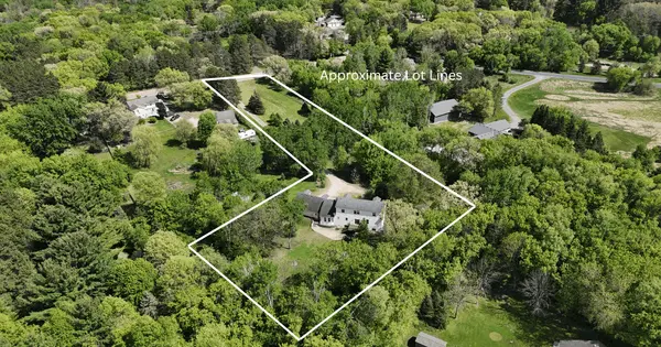 Private Acreage Retreat in Ham Lake: Beautiful Two-Story Home with Modern Updates & Endless Outdoor Space