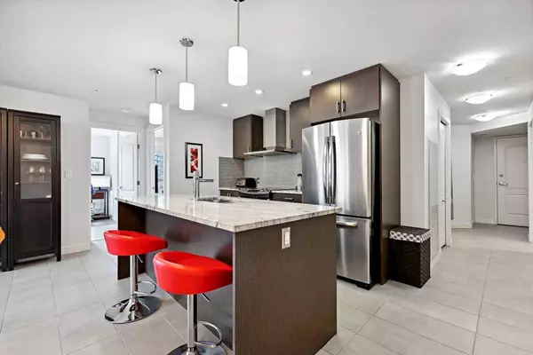 303 13 AVE SW #404, Calgary, AB T2R 0Y9