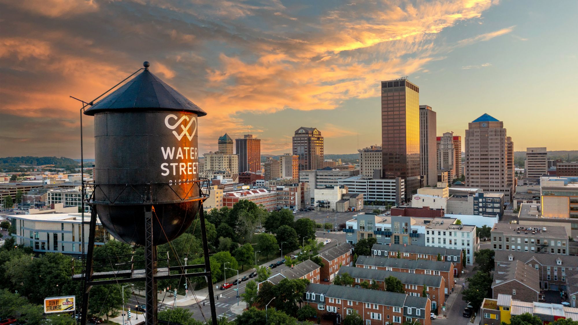 Image of Downtown Dayton with the Water Street Water Tower prominently featured. The shot is from a higher elevation.