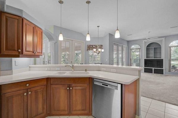 Kitchen with open layout in Calusa Lakes home Nokomis Florida
