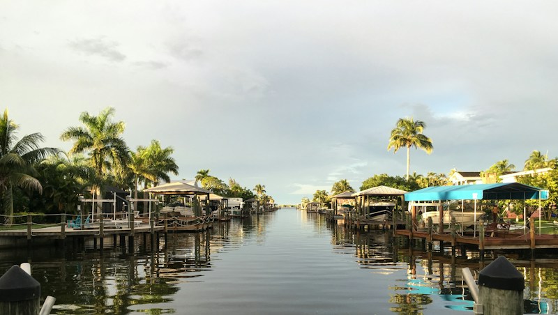 Private docks and boat lifts along a navigable canal in northeast Boca Raton