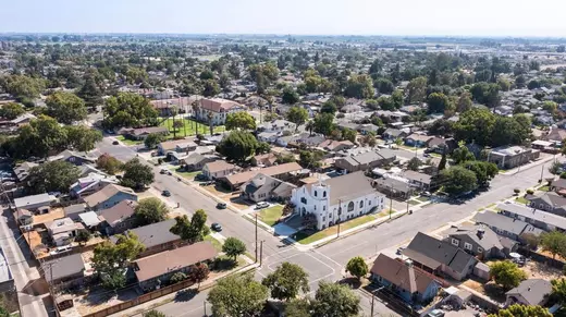 Residential neighborhood in Turlock CA featuring single-family homes for sale