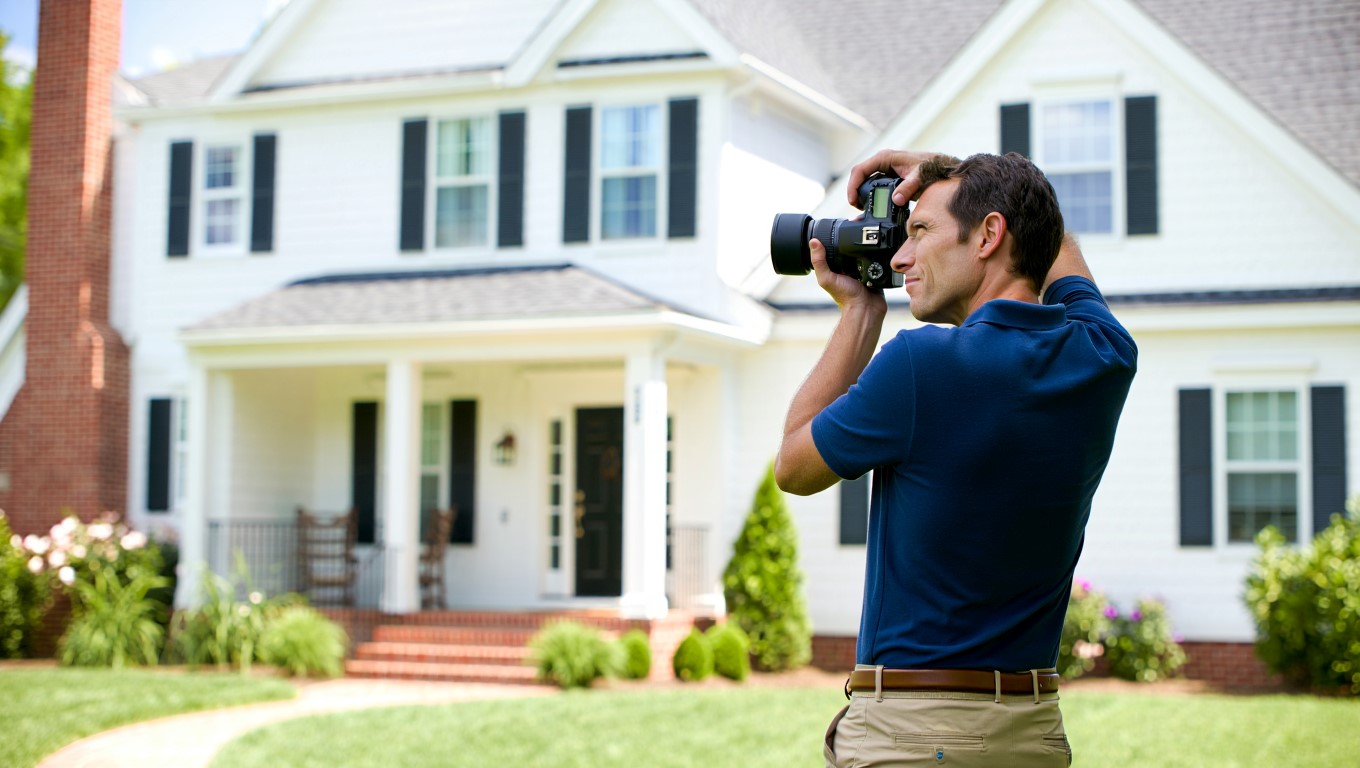 Photographer taking real estate photos