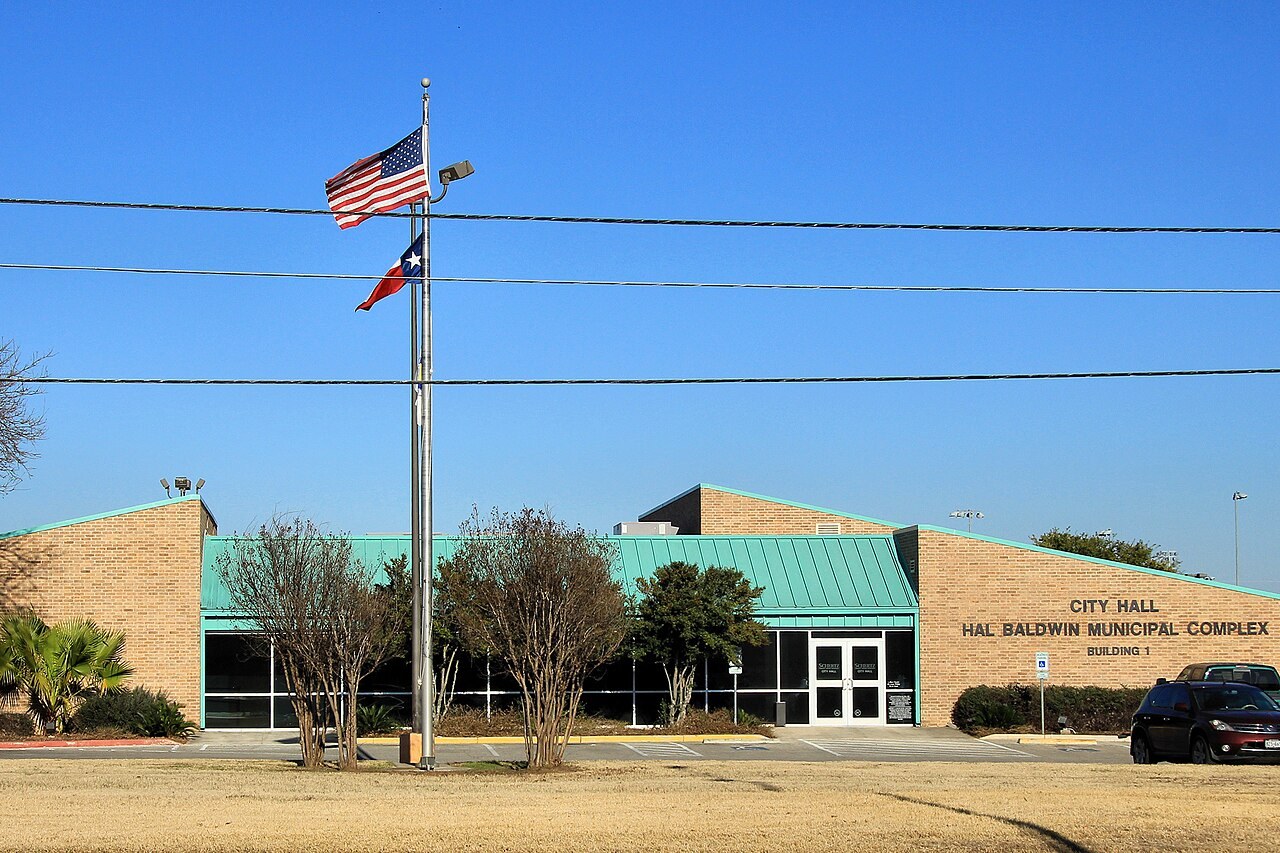 Schertz City Hall with flags out front