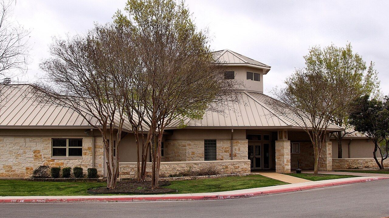 Cibolo City Hall, a stone building with a standing-seam roof