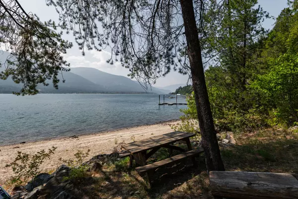 iews and dock access, surrounded by trees near Nelson, BC
