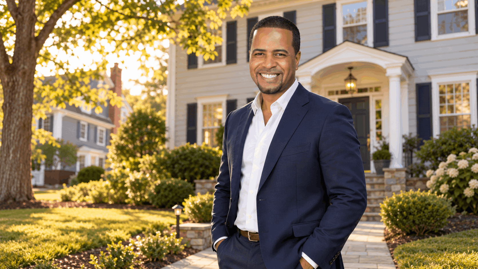 Johnny Rodriguez, North Jersey Realtor, standing outside a colonial-style home in Clifton, NJ, helping homeowners with inherited property and real estate decisions.