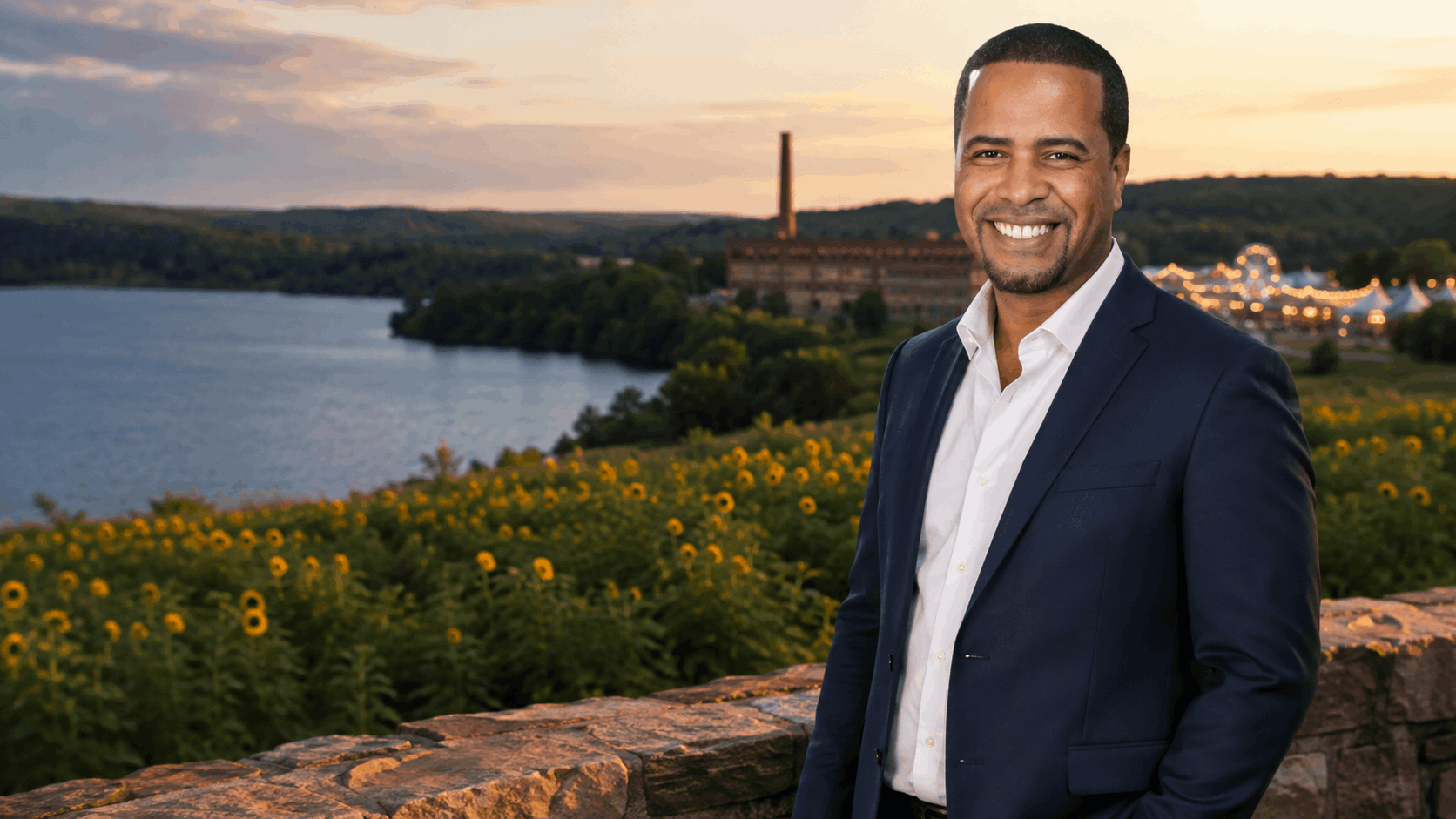 Johnny Rodriguez overlooking a lake, sunflower field, historic factory and summer fair, highlighting unique things to do in North Jersey.
