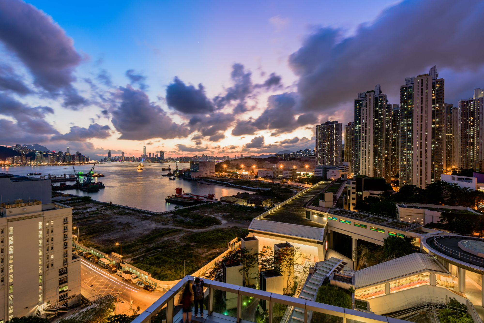 modern-city-with-houses-buildings-sunset