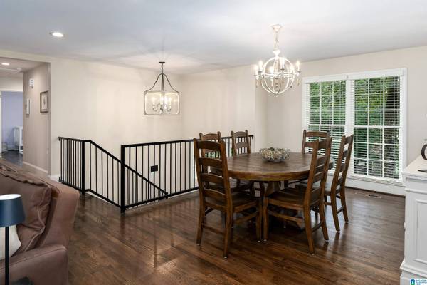 KEYSTONE DR, dining room, double windows with blinds, spacious room fits table of 8, oak wood floors