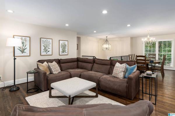 KEYSTONE DR, open plan, beautiful oak hardwood floors, sectional sofa and seperate chair, coffee table, smooth ceilings and can lights