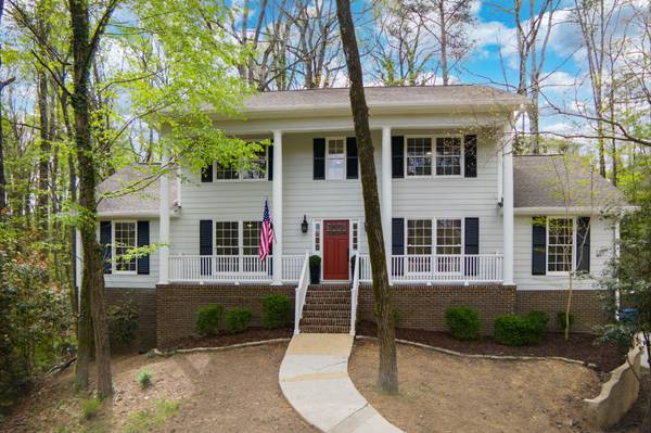 Welcoming exterior with neutral paint and clean landscaping