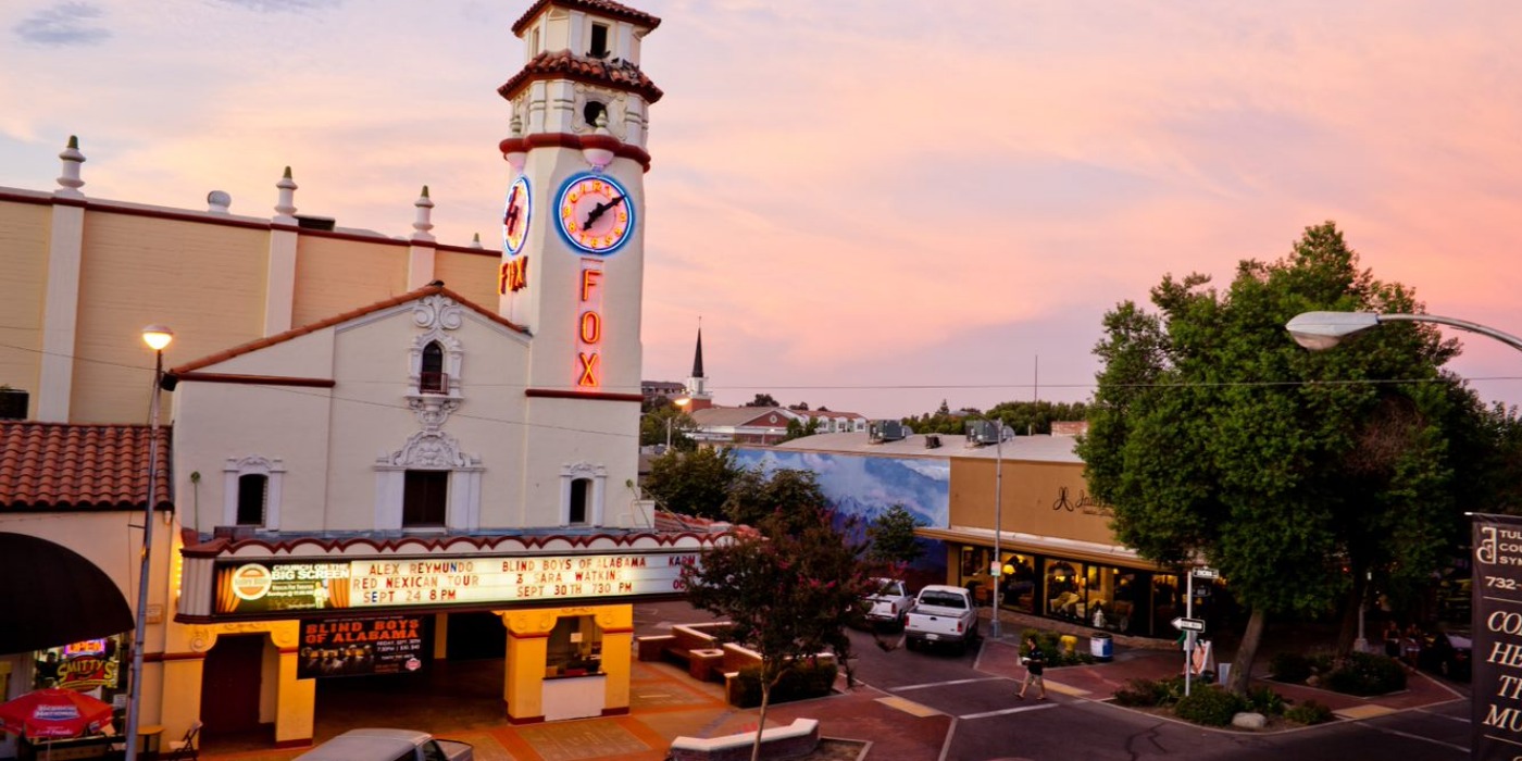 Visalia Fox Theatre at sunset in downtown Visalia, California – Living Central CA real estate, The Lopez Group powered by the Santy Philips Group at Real Brokerage
