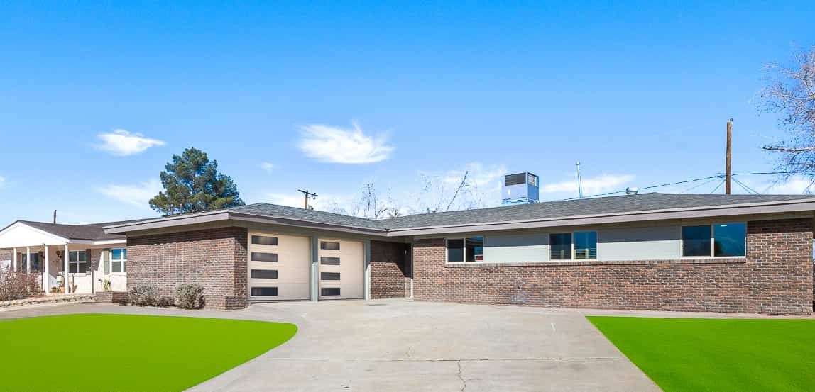 Front exterior with clean curb appeal and shaded entry — El Paso