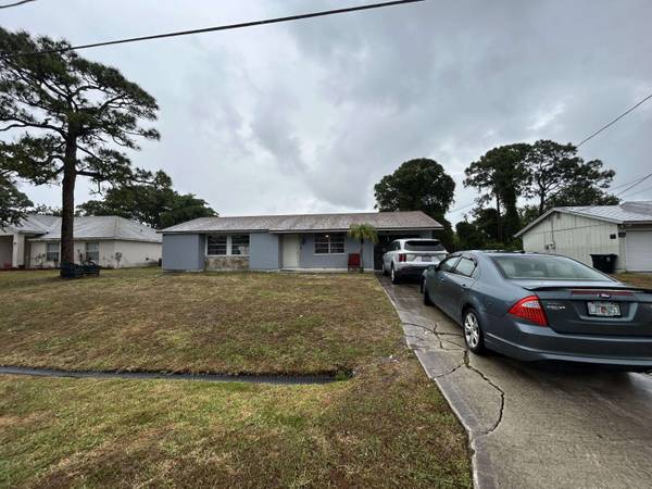 213 SW Chapman AVE, Port Saint Lucie, FL 34953